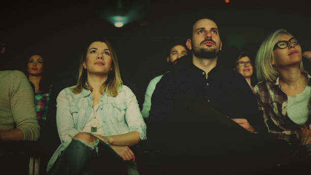 istock People relaxing at cinema 850384322
