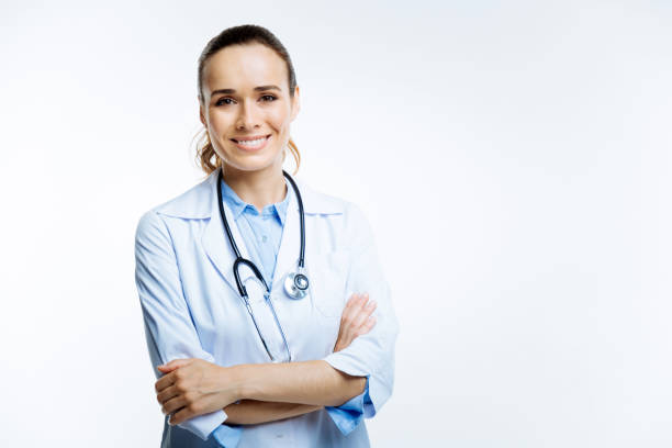 istock Beautiful female doctor smiling into camera 850620984