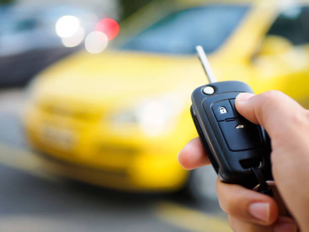 istock Hand presses on the remote control car alarm systems. 850623698