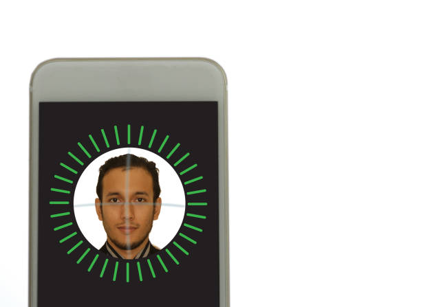 istock mobile with face recognition is enabled by the True Depth or deep camera and is simple to set up. It analyzes with many dots to create a precise depth map on the face. 850636216