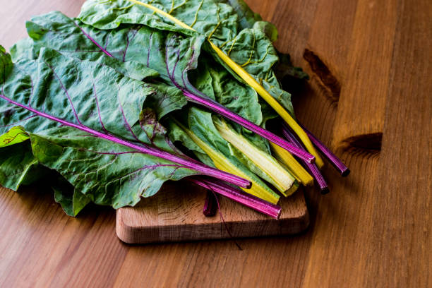 istock Raw Organic Rainbow Swiss Chard on wooden surface. 850640426