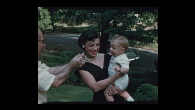 Glam 50s mom, infant baby and grandfather