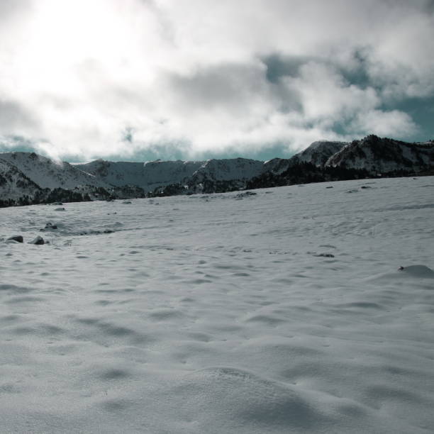 istock snowy landscape and cloudy sky in Pyrenees. 850659028