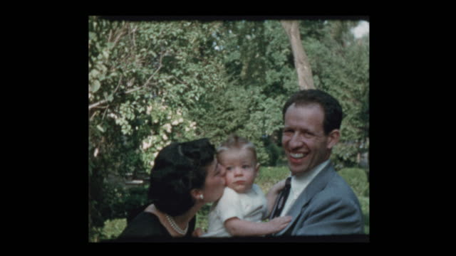 50S Glam Mom, Dad, & Grandmother With New Baby
