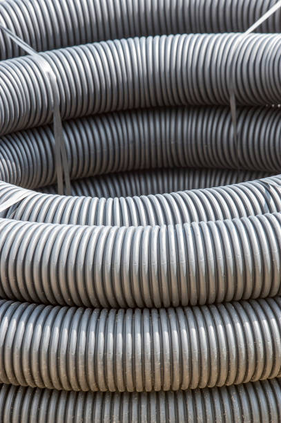 istock Roll of black flexible conduit nylon pipe background 850669194