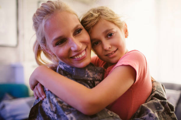istock Army Mom With Her Little Girl 850669546