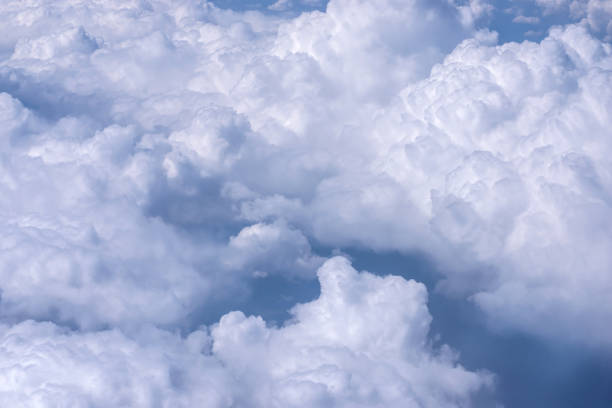 istock View of blue sky above the clouds from airplane window 850677258