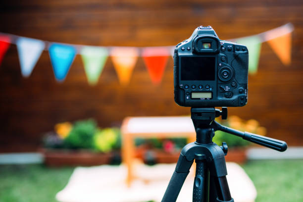 istock Picture of digital camera placed on tripod 850691772