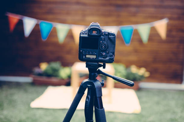 istock Picture of digital camera placed on tripod 850691840