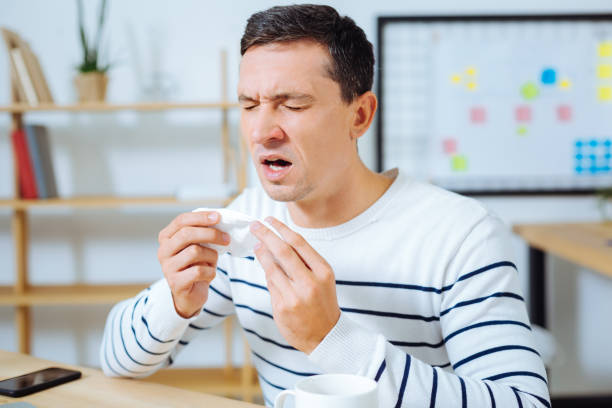 istock Frustrated brunette going to sneeze 850692988