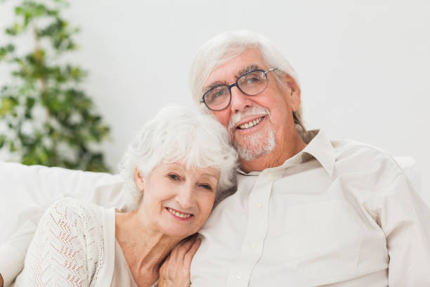 istock Elderly couple on couch 850693454