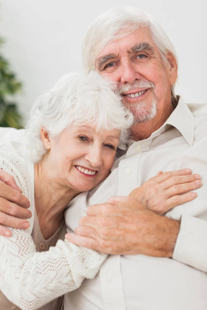 istock Smiling couple on the couch 850693484