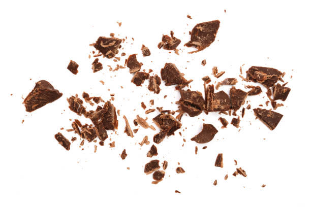 istock grated chocolate isolated on white background. Top view 850703758