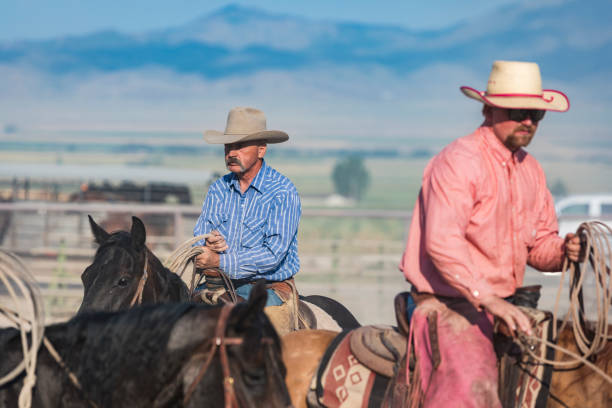 istock Happy cowboys on their horses 850704028