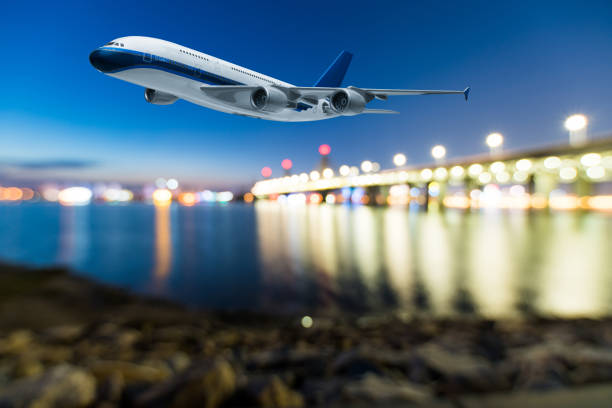 istock perspective view of jet airliner in flight with bokeh background 850705796
