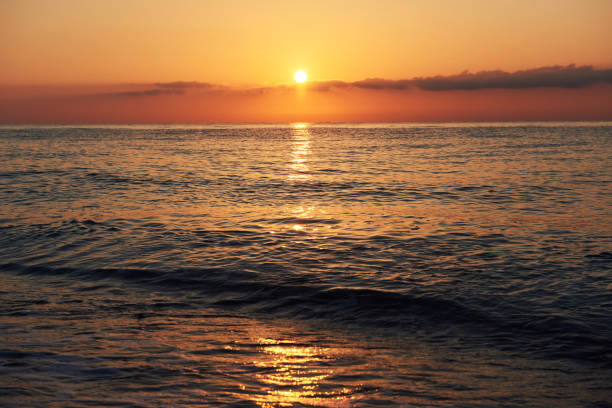 istock Colorful sunset over the sea from colliding waves. Nature composition 850717960