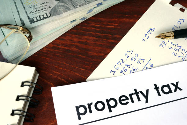 Property tax written on a paper. Financial concept. stock photo
