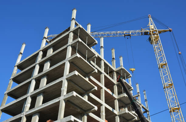 istock Crane Construction Site. Tower crane on industrial building construction. 850756260