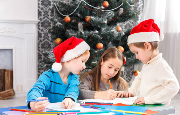 istock Children writing letter to santa, wait for christmas 850763312