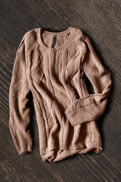 istock Sweater on wooden background 850788860