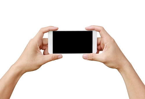 Hand holding mobile smartphone with blank screen. Mobile photography concept. Isolated on white.