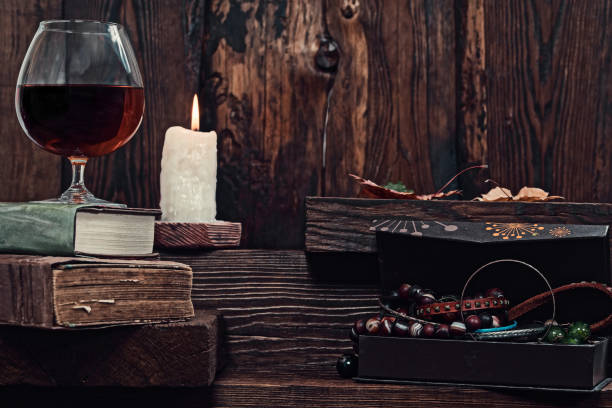 istock Candle burning on wooden shelf 850812282
