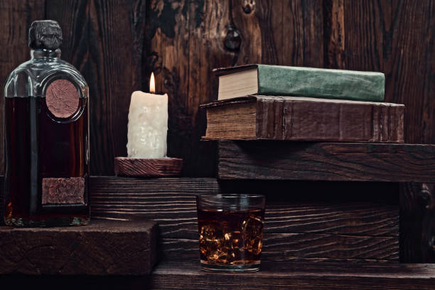 istock Candle burning on wooden shelf 850812712