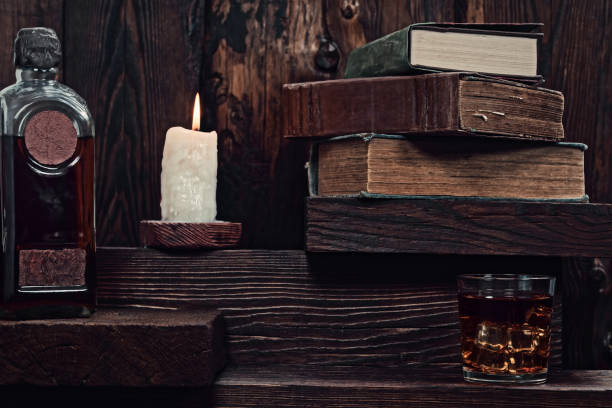 istock Candle burning on wooden shelf 850812724