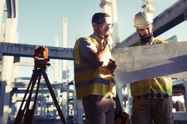 istock Portrait of construction engineers working on building site 850822220