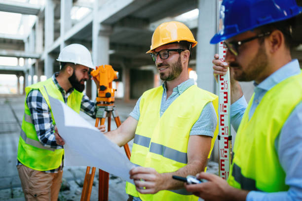 istock Portrait of construction engineers working on building site 850823818