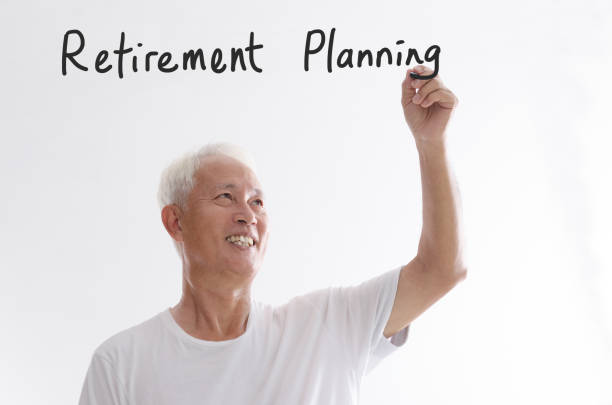istock Old Asian man writing retirement planning 850824286
