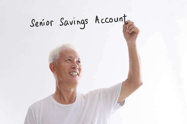 istock Old Asian man writing senior savings account 850828784