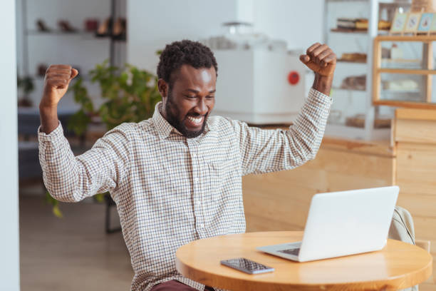 istock Happy young man celebrating after achieving his goal 850832714