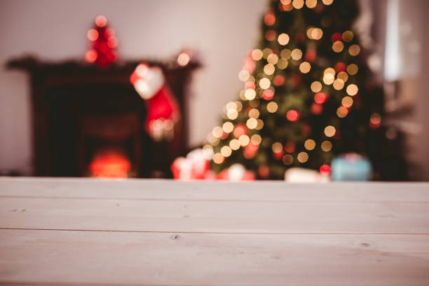 istock Desk with christmas tree in background 850834306