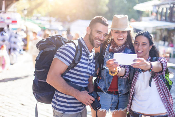 istock Cheerful tourists taking selfie 850845760