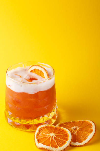 istock Orange cocktail with citron on colorful background 850845880