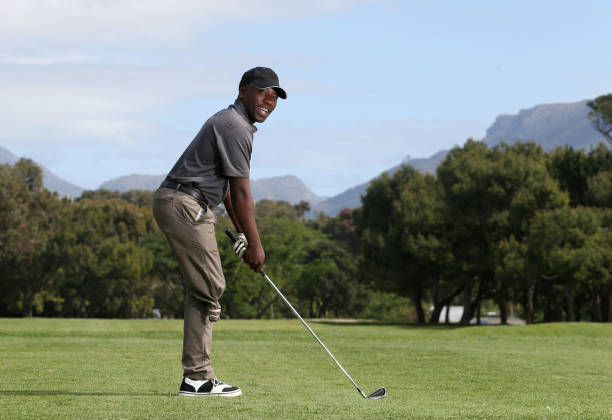 istock A young black man with only one leg playing golf 850847078