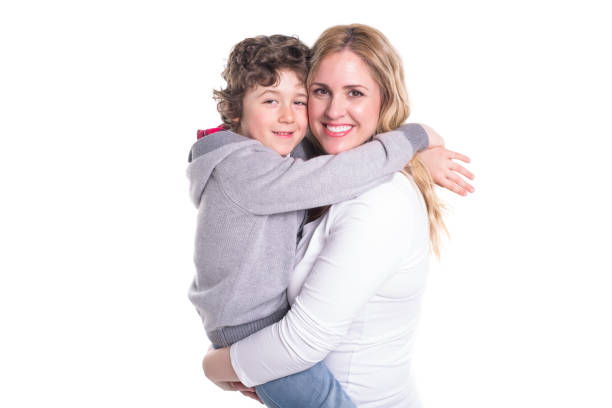 istock happy young mother with a child on light background 850851914
