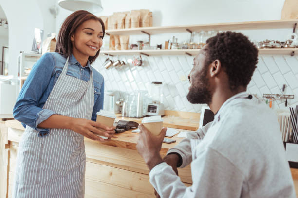 istock Upbeat baristas chatting during break from work 850858378