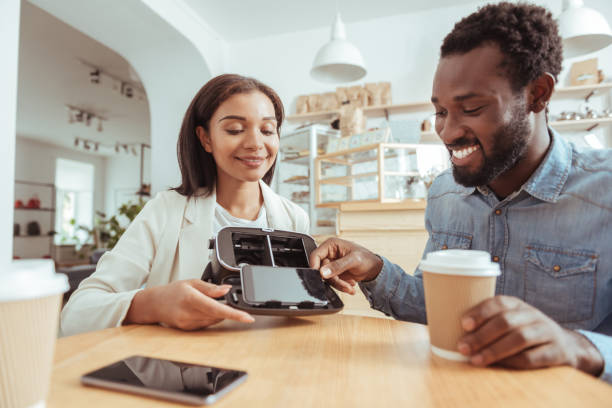 istock Pleasant man removing phone from his friends VR headset 850863850