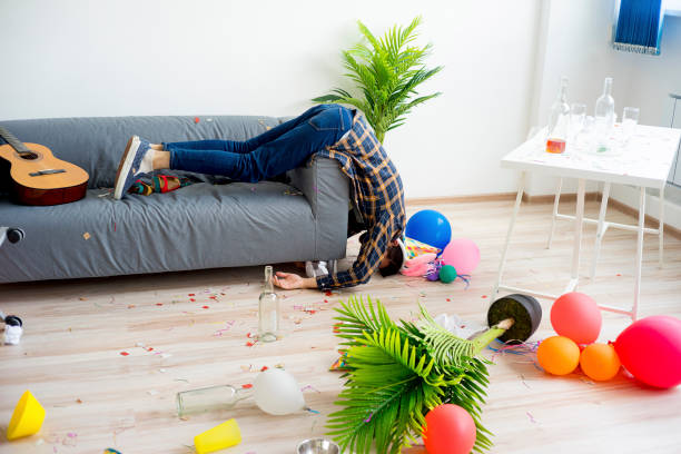 Hangover after a party A guy is sleeping after a party with a hangover after party stock pictures, royalty-free photos & images