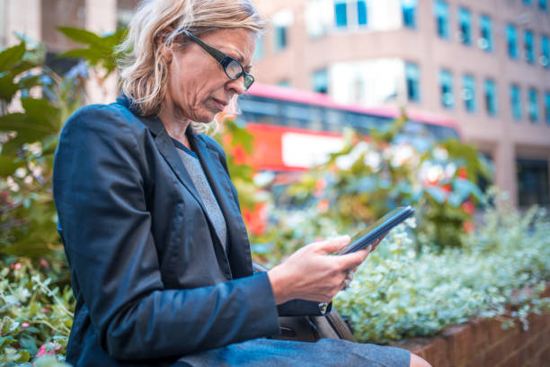 istock Waiting for coworkers in a park 850880854