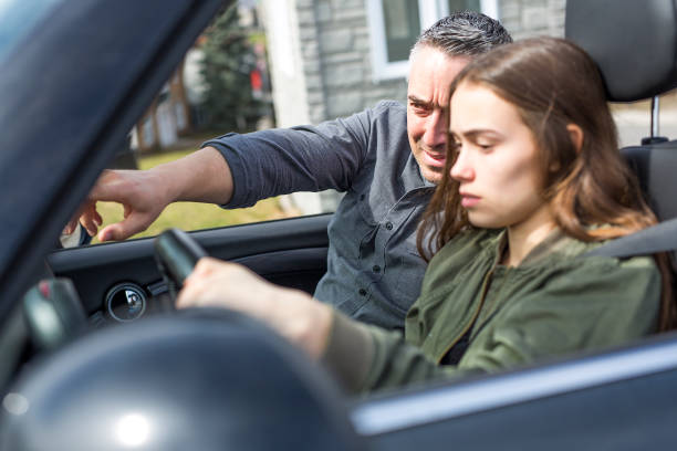 Teen learning to drive or taking driving test