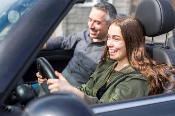 istock Teen learning to drive or taking driving test 850884444