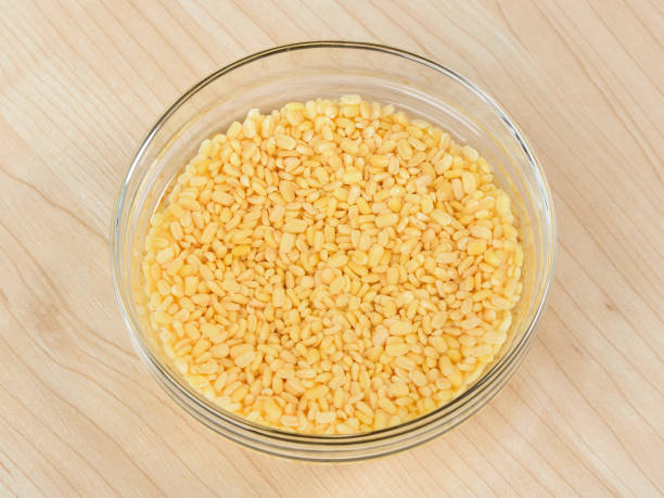 istock Mung bean in a glasses bowl on wooden table 850884966