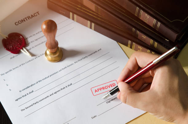 istock Notary signing a contract with fountain pen 850889820