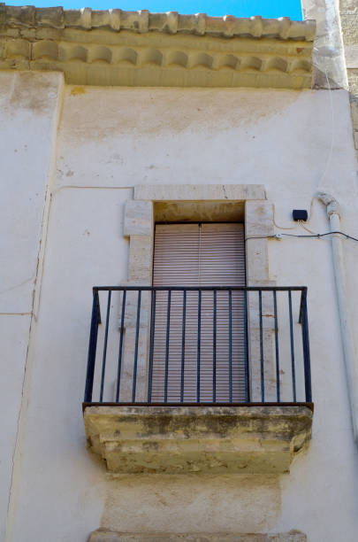 istock Stylish balcony with a metal railing, solid architectural element, a place of rest and relaxation, vintage decor 850890262