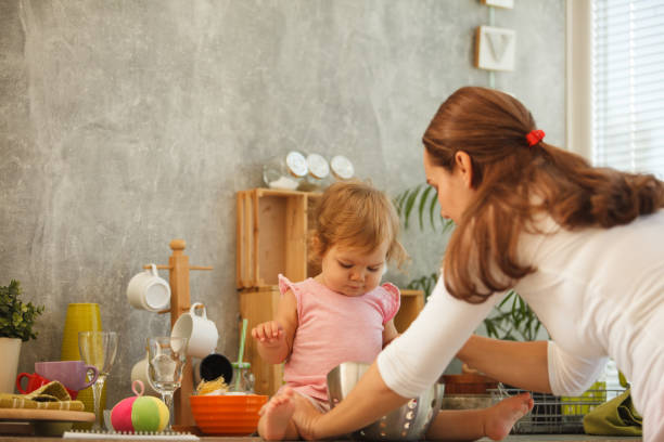 istock Mom and baby in domestic kitchen 850904768