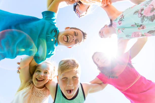 istock Group of child have fun on a field 850906922
