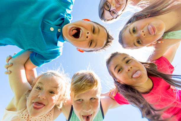 istock Group of child have fun on a field 850909130